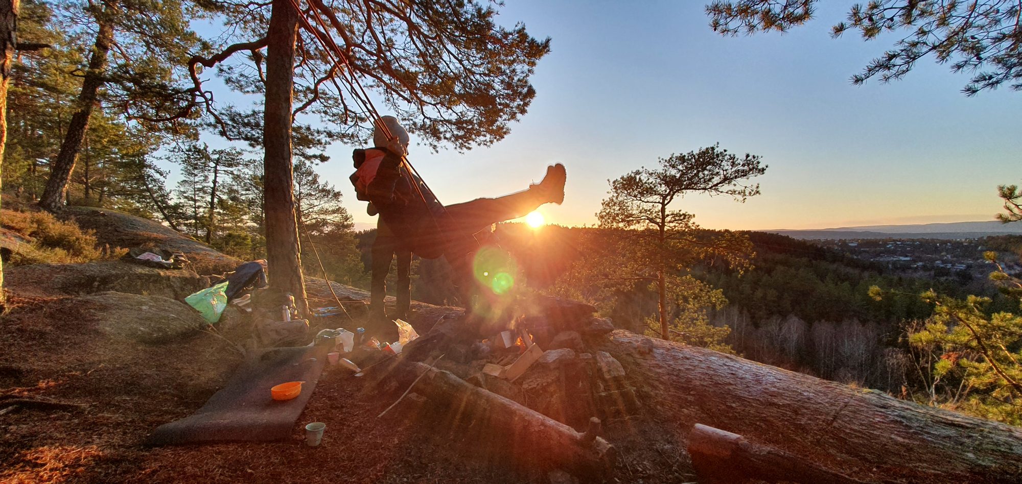 Girl,On,A,Swing,During,Sunset,At,A,Camp,Site